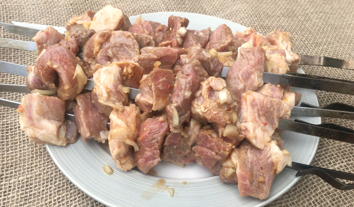 Shashlik or shashlyk (meaning skewered meat) was originally made of lamb.  Nowadays it is also made of pork or beef depending on local preferences and  Stock Photo - Alamy